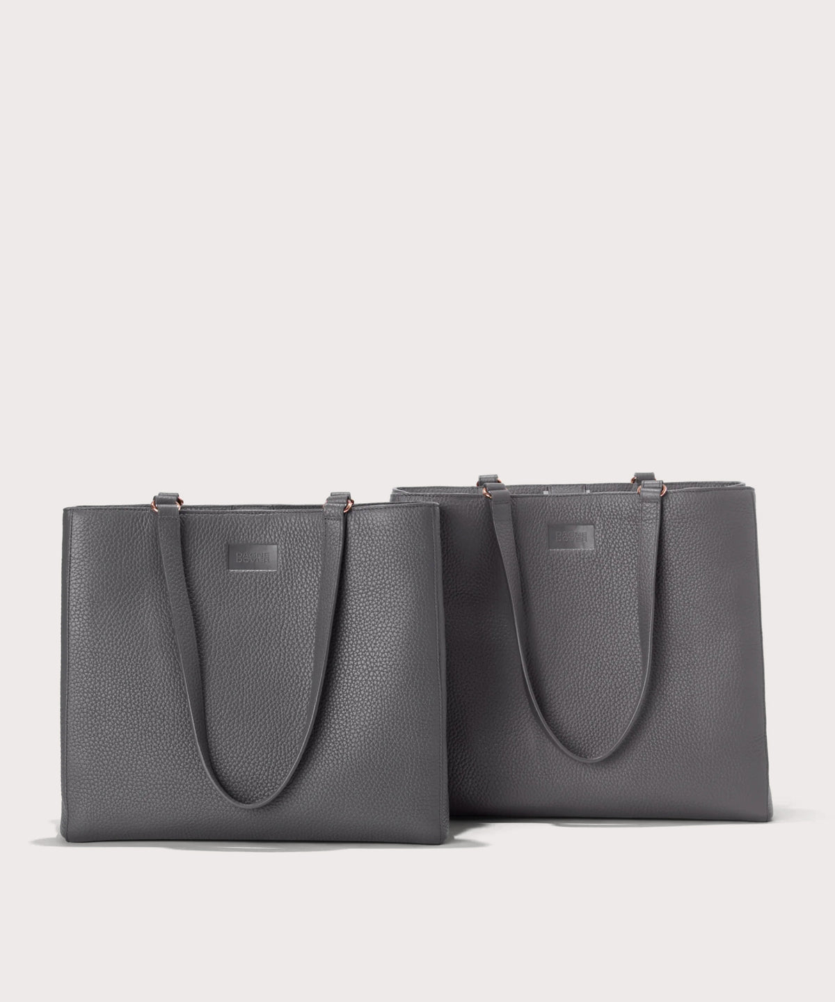 Dagne Dover medium and large Allyn Totes in grey.