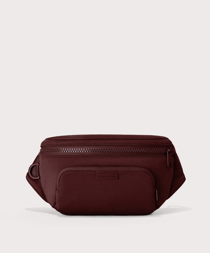 Dagne Dover Jax Large Fanny Pack in a deep brown with purple undertones.
