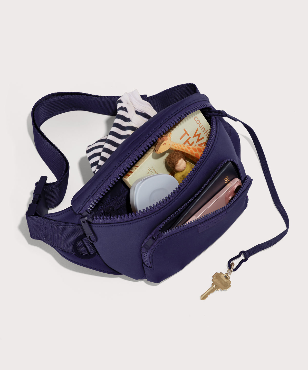 Jax in a jewel-toned, deep blue with strong purple undertones unzipped, top down view.