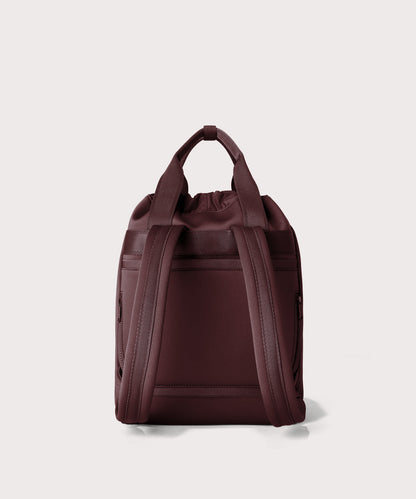 Rhys Backpack in a deep brown with purple undertones seen from the back.
