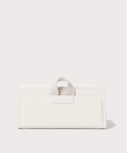 Dagne Dover Remi foldable glasses holder in white.