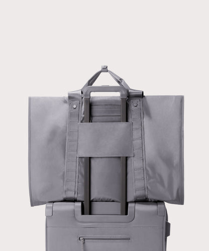 Back view of Capri garment bag in ash on luggage handle