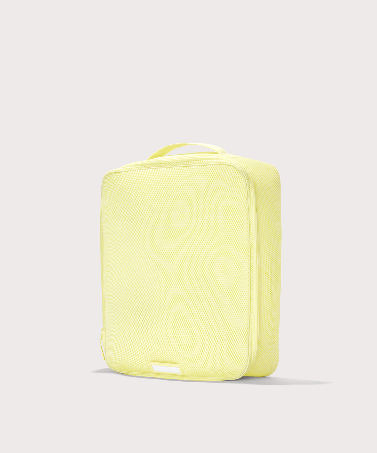 3/4 view of extra large Roma packing cube in citrine