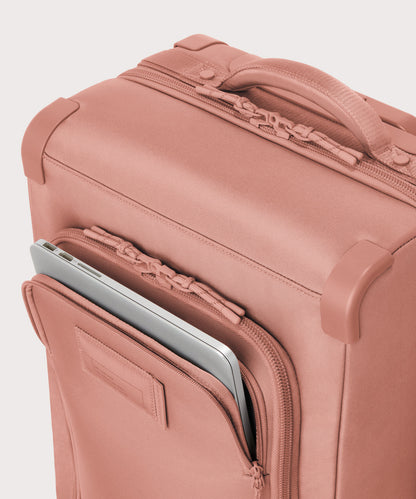 Caption: Front pocket fits most 13” laptops